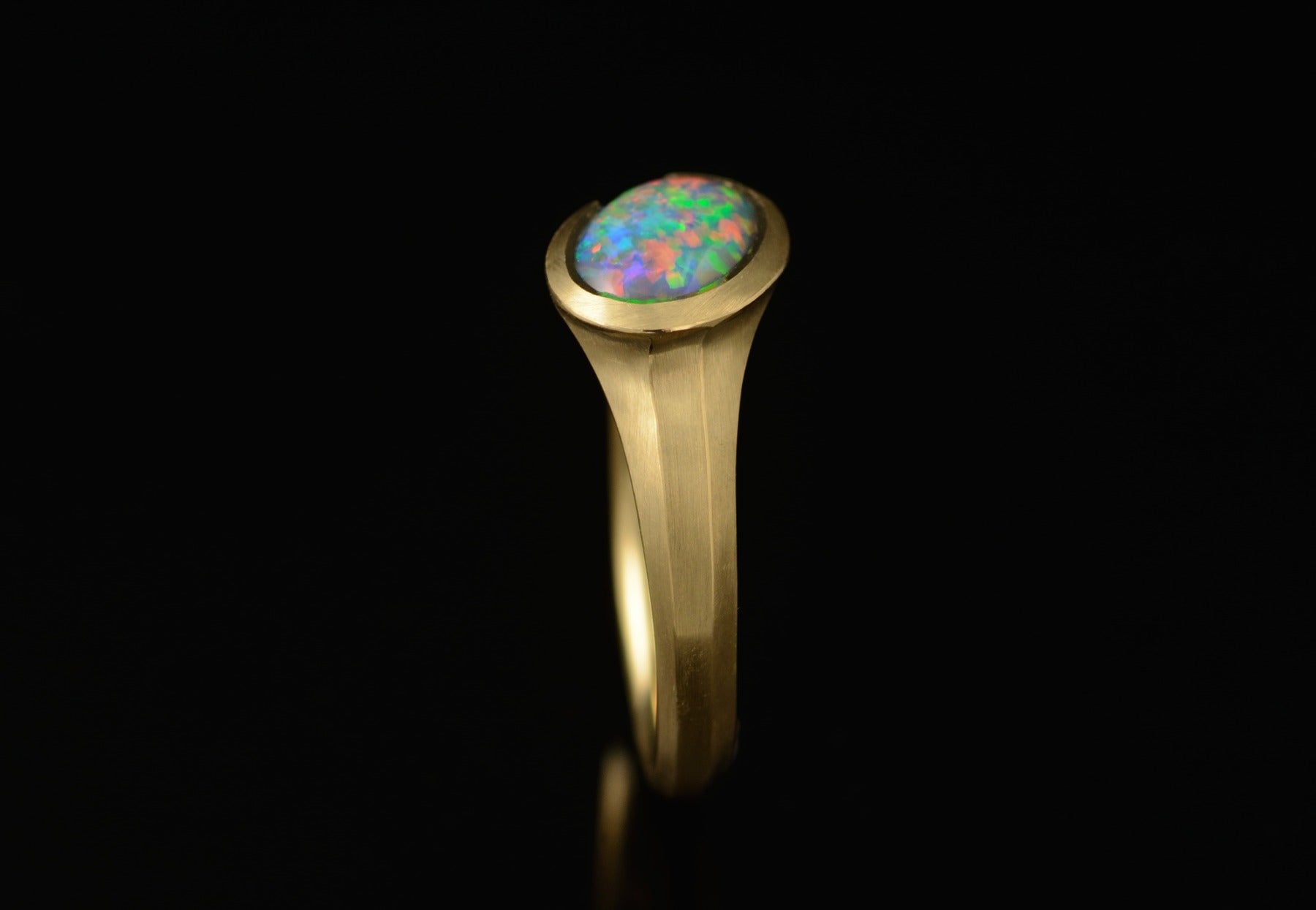 Carved yellow gold and opal ring