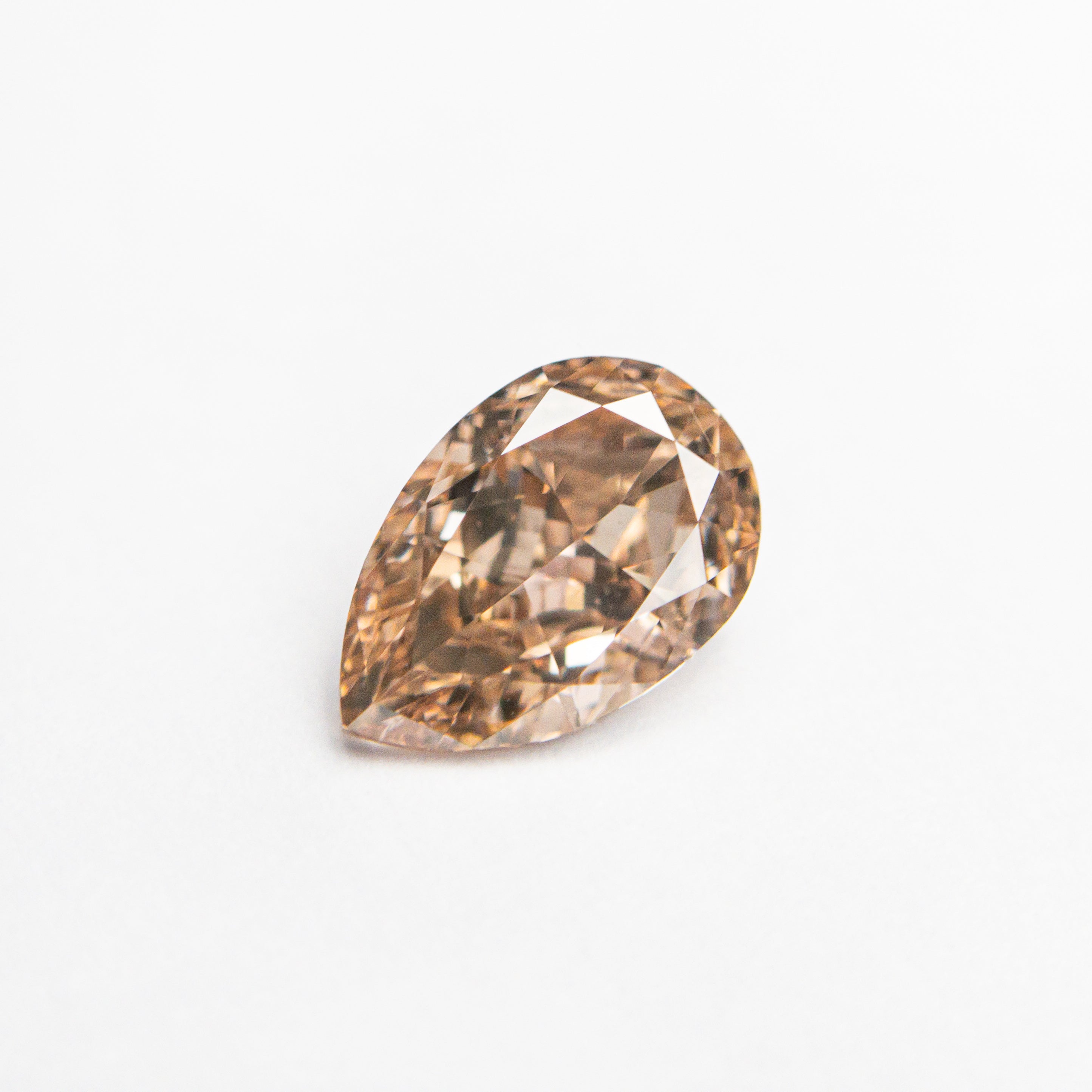 0.68ct 7.06x4.68x2.76mm VS2 Fancy Brownish Pink Pear Brilliant 🇦🇺 24112-01