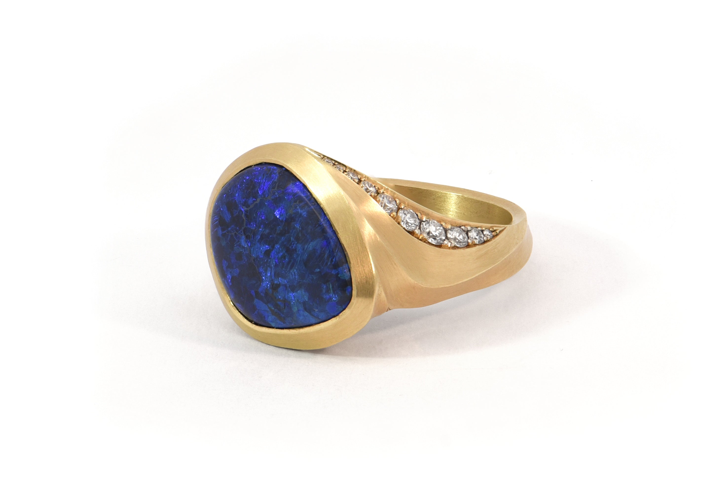 Lightning ridge opal and diamond Arris ring.