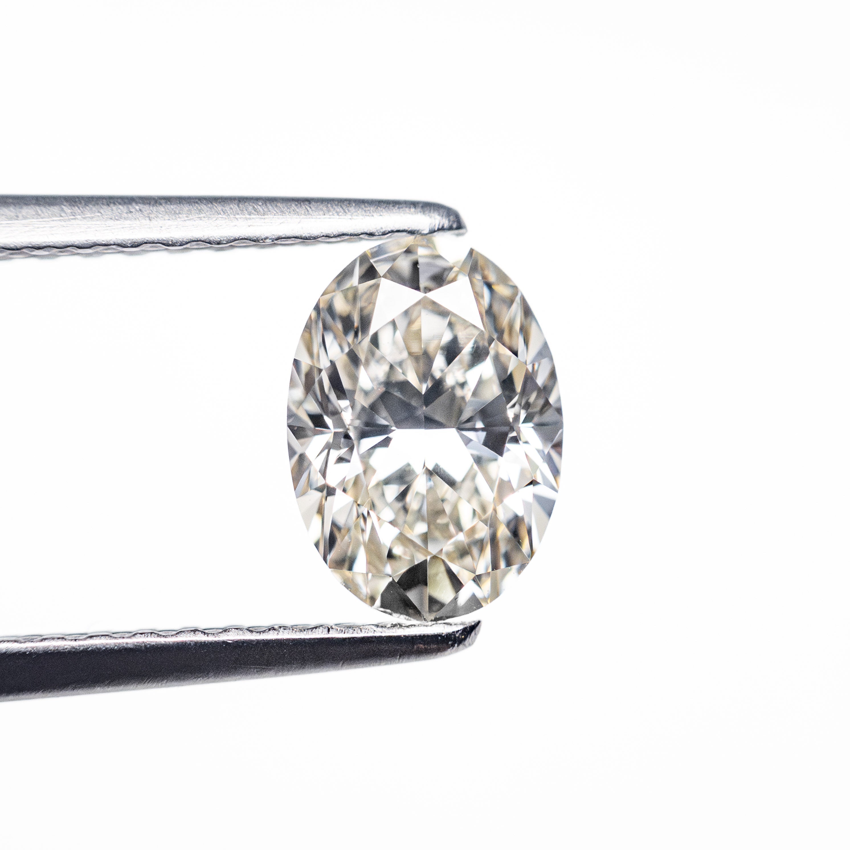 0.91ct 7.40x5.29x3.41mm VS2 M-N Oval Brilliant 🇨🇦 25690-01