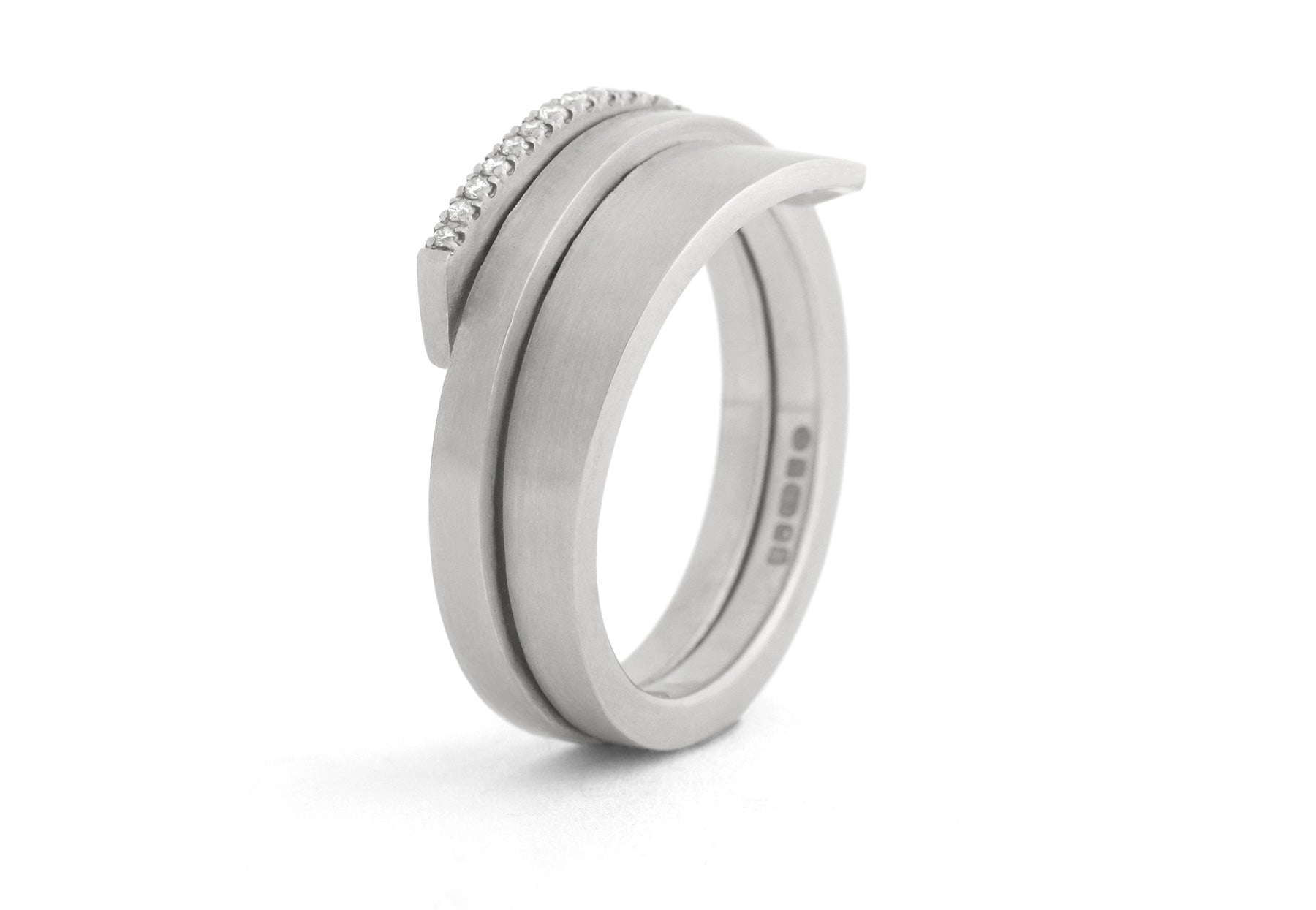 Triple overlap platinum wedding eternity ring with white diamonds