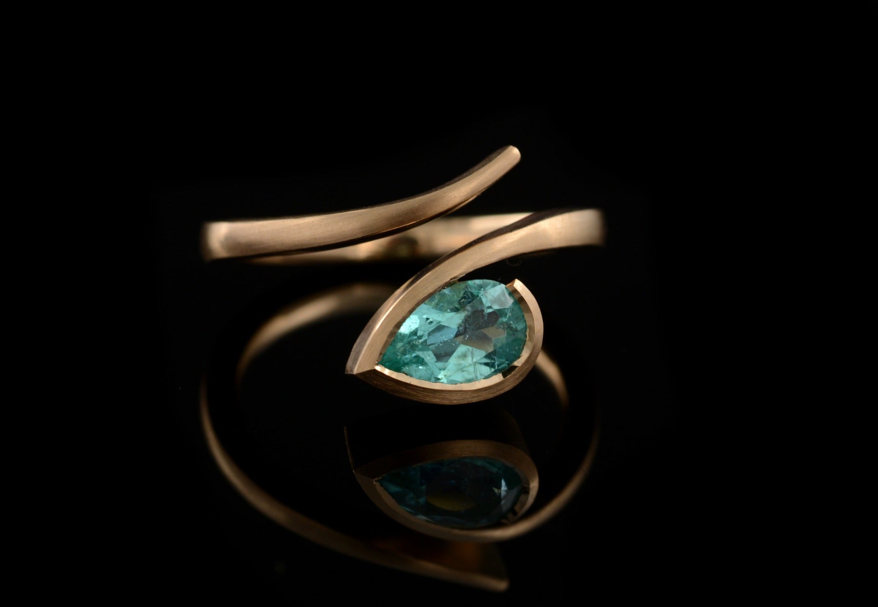 Twist paraiba tourmaline rose gold engagement ring