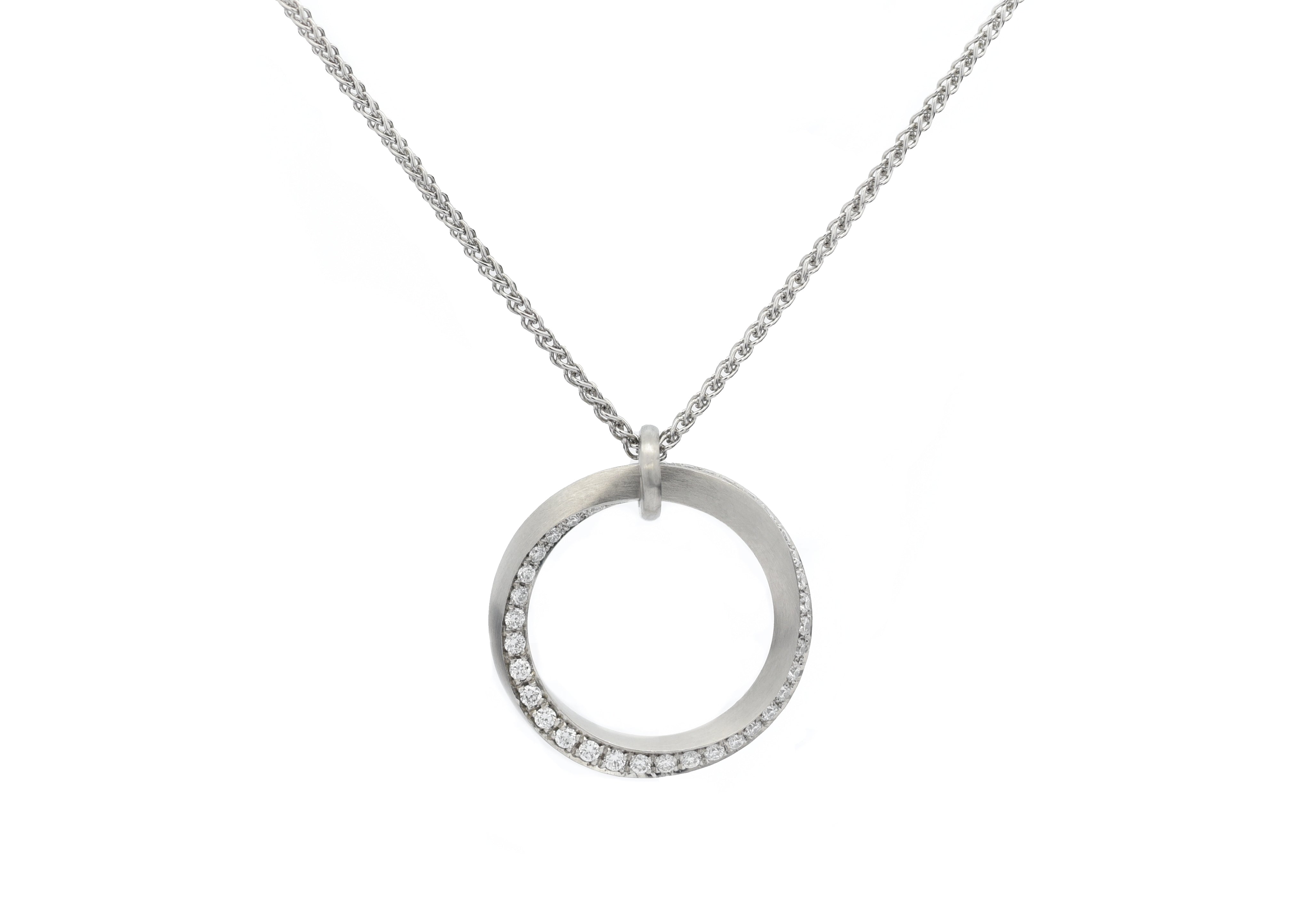 Platinum Mobius and diamond pendant