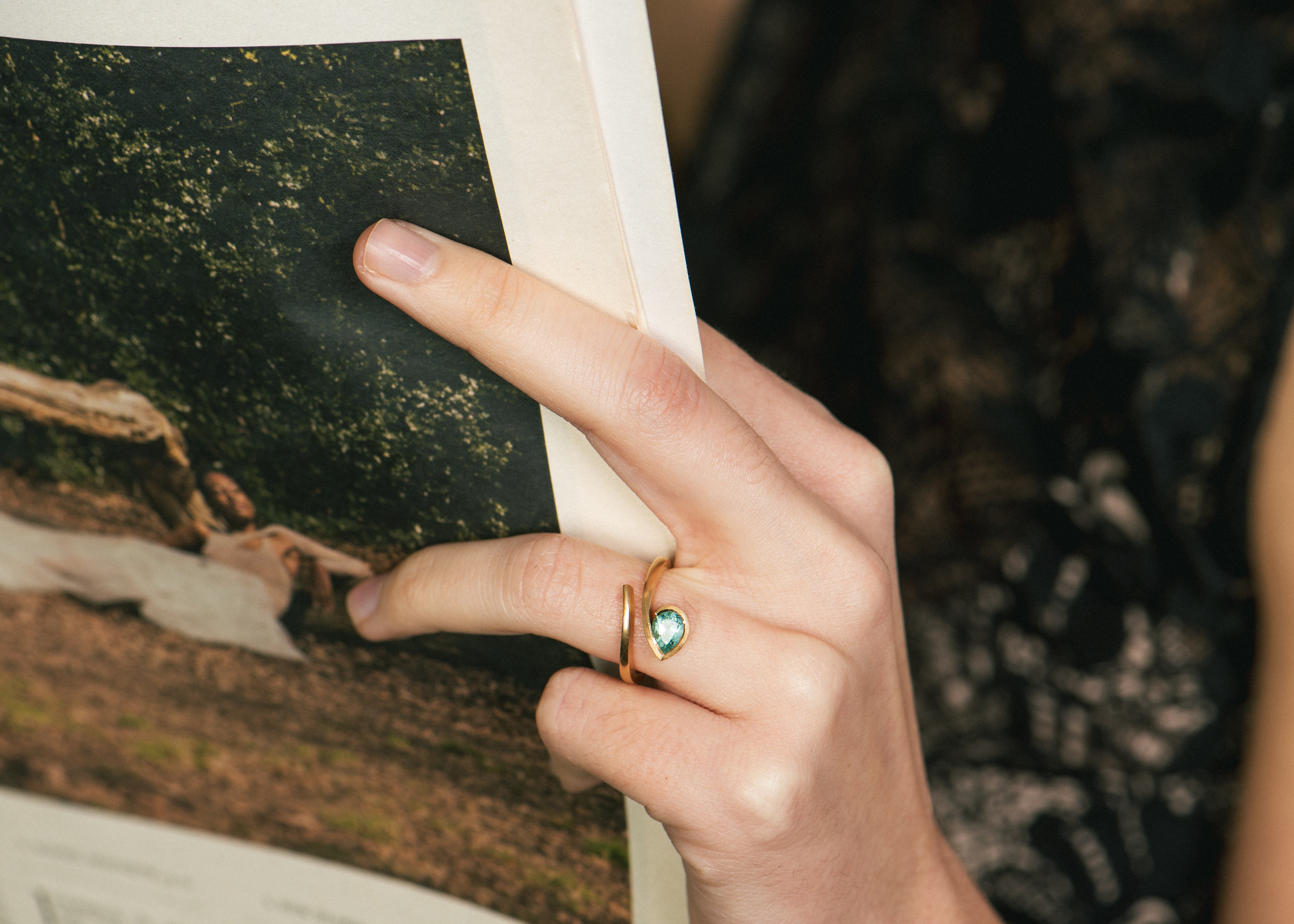 Rose gold Twist engagement ring with pear Paraiba tourmaline