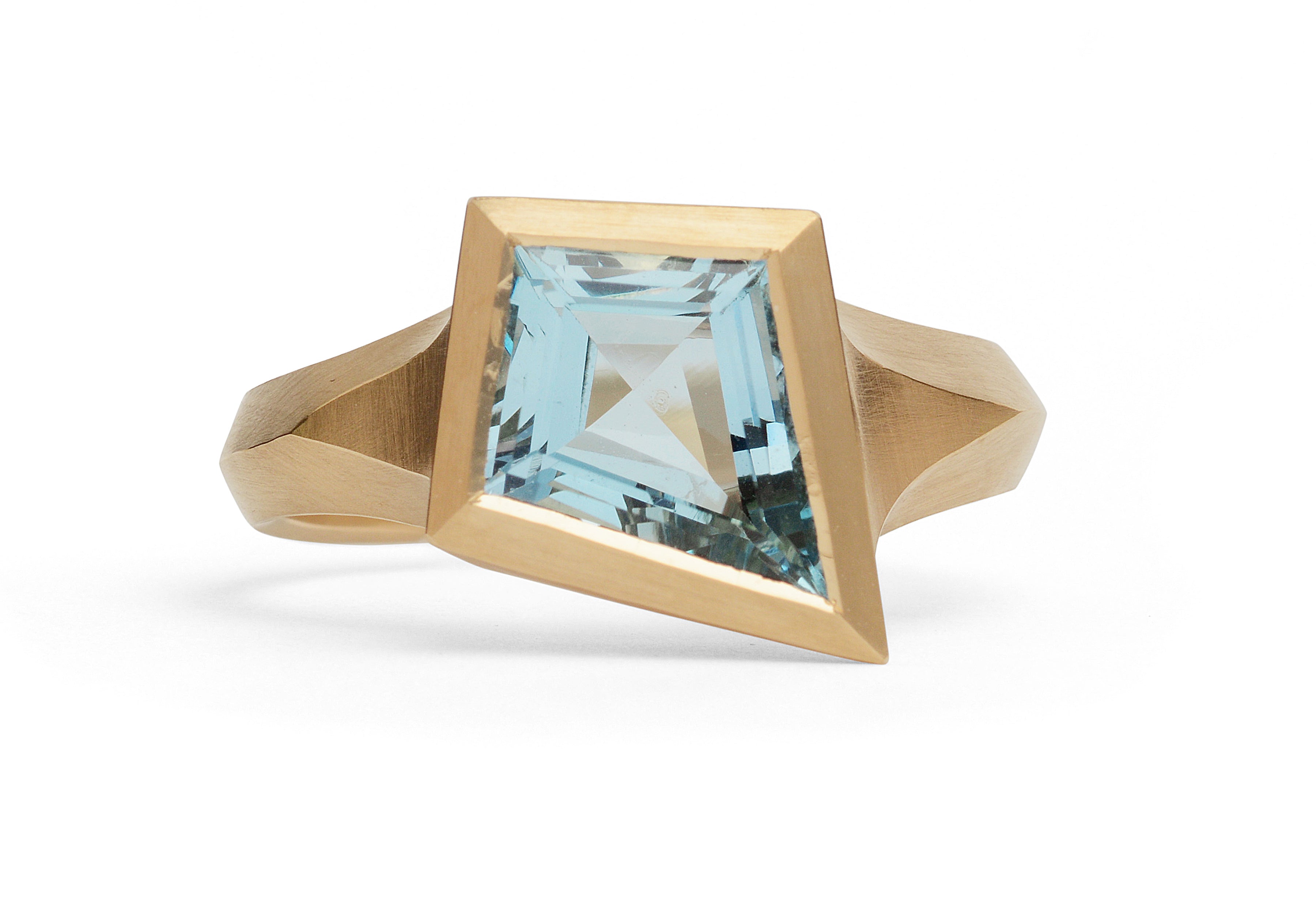 Aegis ring in 18ct yellow gold set with a kite shaped aquamarine