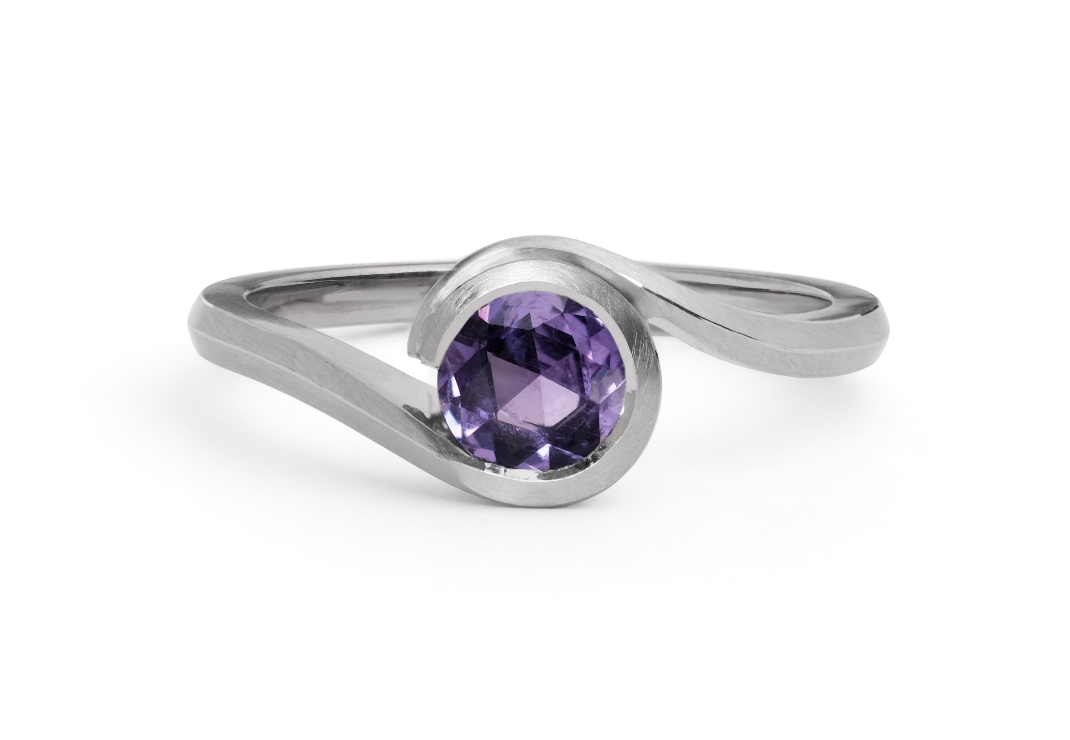 Platinum and violet sapphire wave engagement ring-McCaul