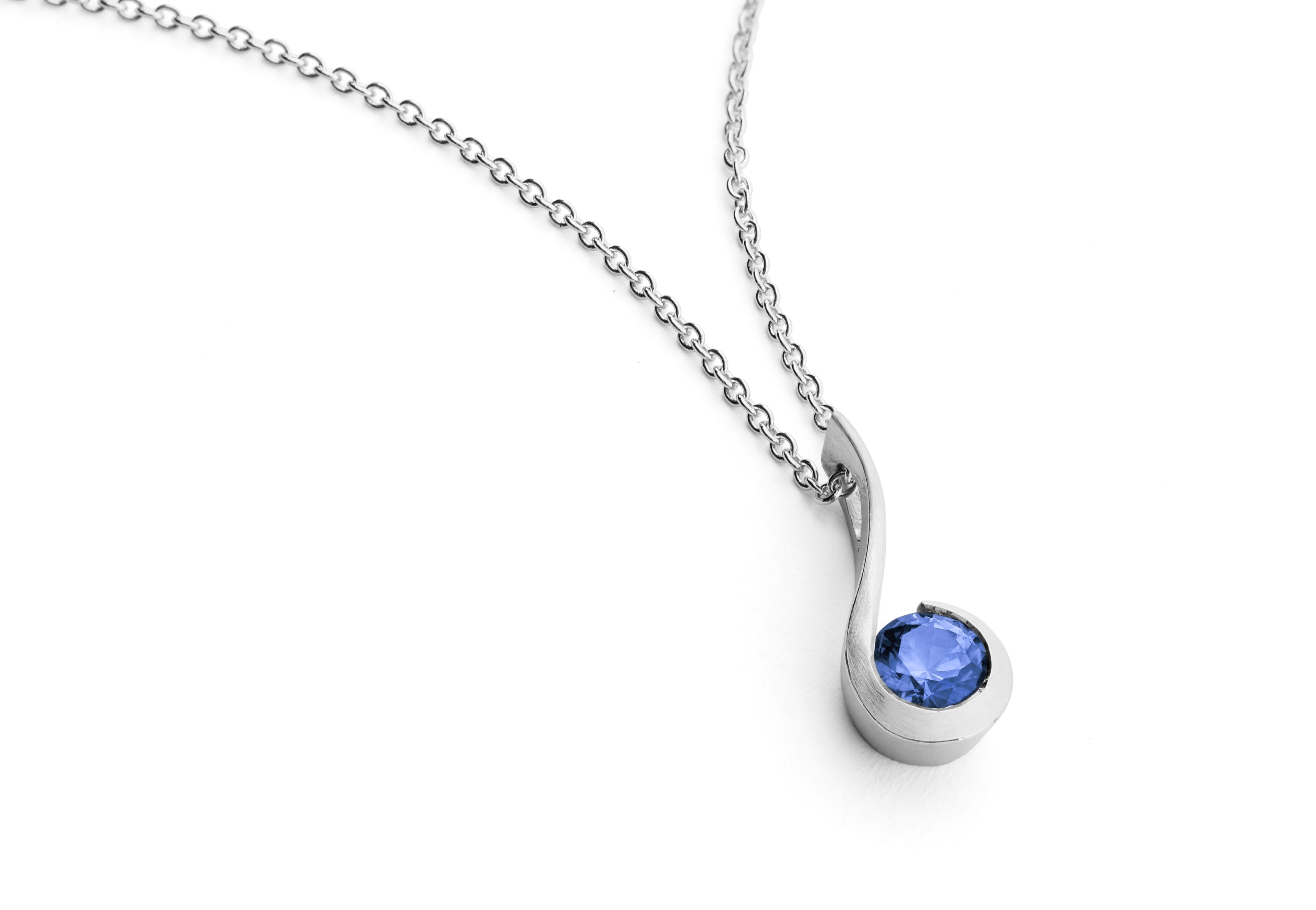 Platinum and sapphire twist pendant